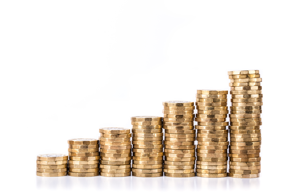 A row of 7 stacks of pound coins arranged in ascending order of height from left to right, against a plain white background.