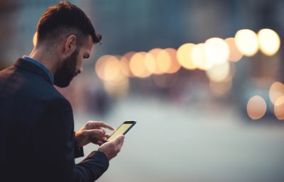 a man looking up the required qualification for becoming a financial adviser