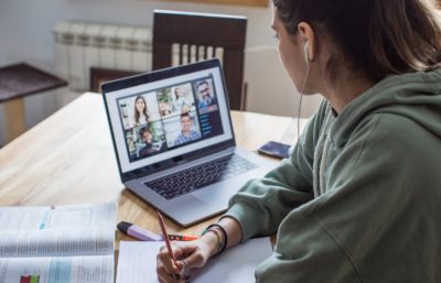 A female financial services student attending a webinar.