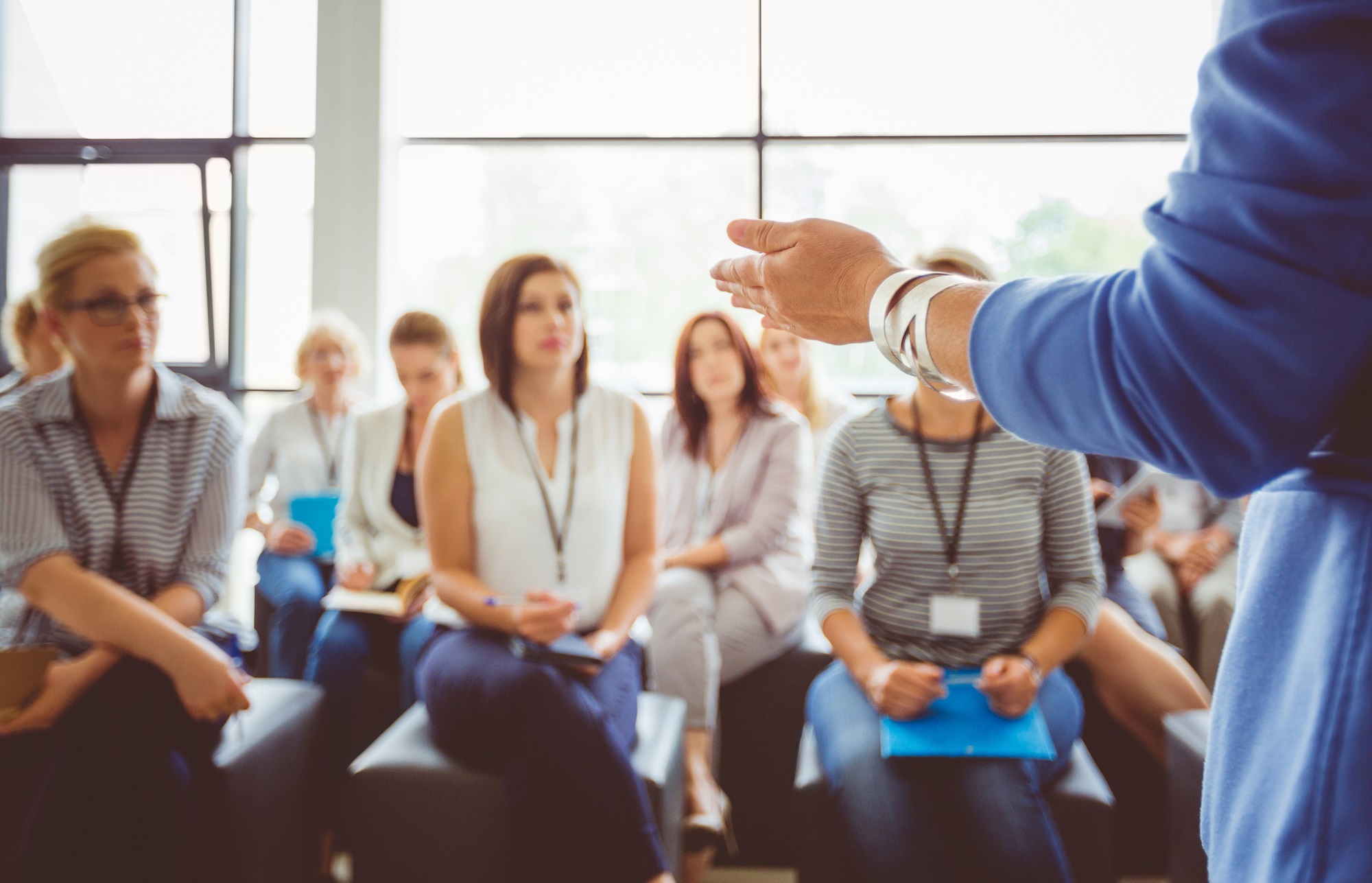 A woman in a corporate training class