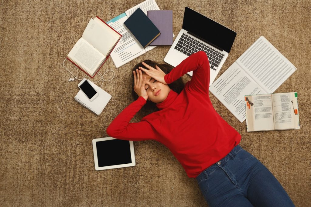 a stressed student during a revision session. 