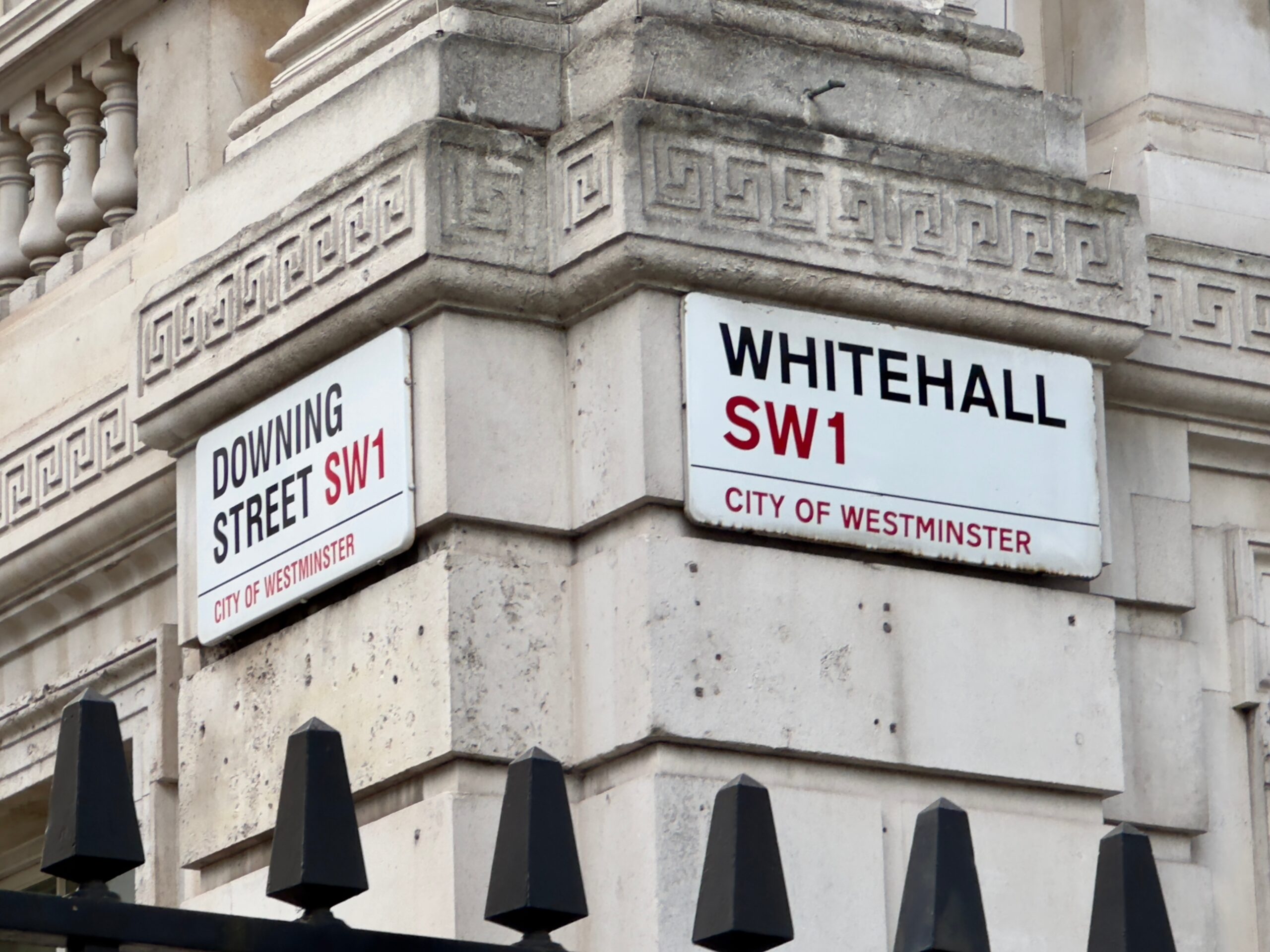 Downing Street and Whitehall signs in Westminster, centre of UK government.